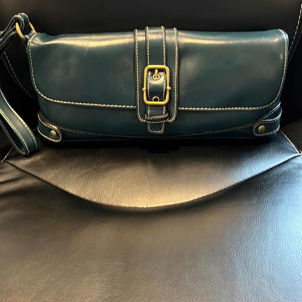 NWOT. PVC Teal Rectangular Clutch with Magnetic Brass Closure.